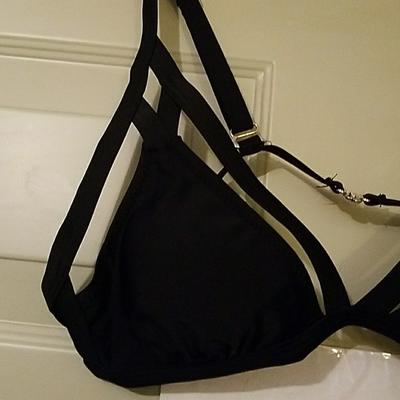 Strappy black swim top. Nwt