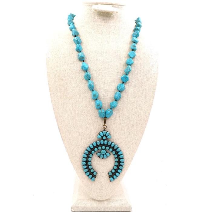 NKS190203-02 BLU-TURQ/BRS Blue-turquoise bead knotted necklace with blue-turquoise brass plated squash blossom pendent