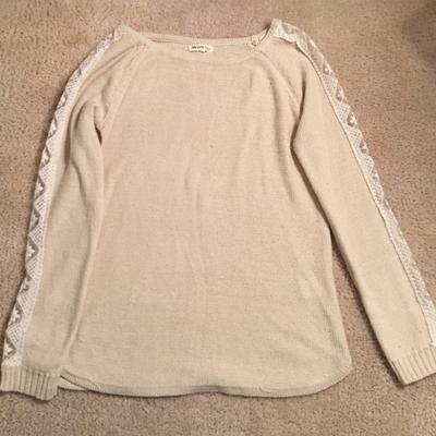 Miracle City cream sweater with lace up the armsnTobi