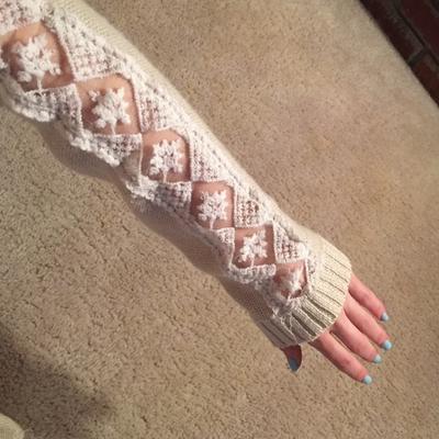 Miracle City cream sweater with lace up the armsnTobi