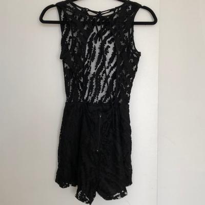 Original black romper with open back