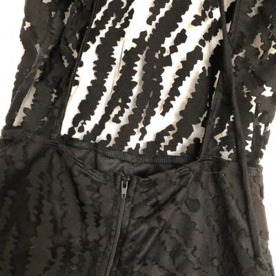 Original black romper with open back