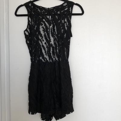 Original black romper with open back